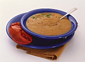 A Bowl of Lobster Bisque with Lobster Claw