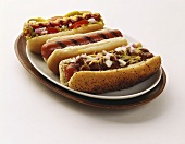 Three Assorted Hot Dogs: Loaded, Plain and with Chili