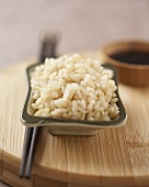 Small Dish of Cooked Brown Rice, Chopsticks