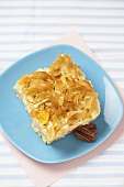 Piece of Kugel on a Blue Plate