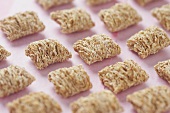 Pieces of Shredded Wheat Cereal in Rows