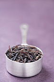 Close Up of Wild Rice in a Metal Measuring Cup
