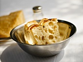 Bread Slices in a Silver Mixing Bowl