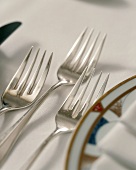 Close Up of Three Forks at a Place Setting
