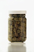 Jar of Organic Capote Capers on a White Background