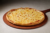 Whole Cheese Pizza on Pizza Board