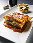 Piece of Vegetable Lasagna Served with Toasted Flat Bread