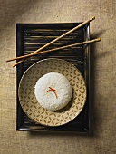 Bowl of Jasmine Rice on a Bamboo Tray with Chopsticks