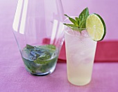 A Mojito with Carafe on Pink Background