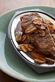Top Sirloin Steak Topped with Mushrooms and Au Jus Sauce