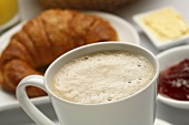 Latte in a Mug with Croissant