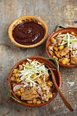 Pork and Hominy Stew with Three Chili Salsa