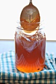 Spoon Scooping Mayhaw Jelly From Jar