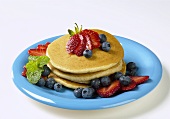 Plate of Pancakes with Fresh Blueberries and Strawberries