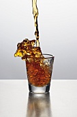 Liquor Pouring into a Shot Glass