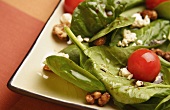 Spinach Salad with Crumbled Cheese and Tomato