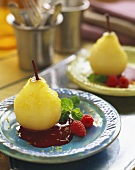 Poached Pears with Chocolate Sauce and Fresh Raspberries