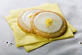 Two Lemon Cookies on a Yellow Napkin