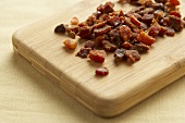 Bacon Bits on a Cutting Board; Close Up