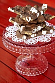 Pieces of marshmallow chocolate on a glass stand
