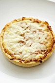 Whole Deep Dish Pizza on a White Background