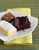 Three Assorted Dessert Squares on a Plate