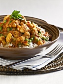 Chicken Curry with Peas Over White Rice