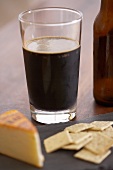 Glass of Dark Beer with Muenster Cheese and Crackers