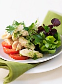 Salad with chicken breast and pesto dressing