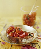 Marinated Tomatoes on a Slice of Crusty Bread
