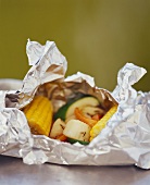 Scallops and Vegetables Cooked in Foil