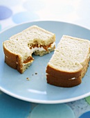 Peanut Butter and Fluff Sandwich on White Bread; Bitten