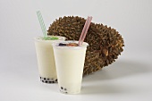 Two Durian Fruit Shakes with Straws; Fresh Durian Fruit