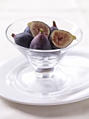 Whole and Halved Figs in a Glass Bowl