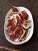 Sliced Italian Ham and Figs on a Platter