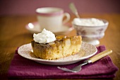 Slice of Pear Cake with Whipped Cream