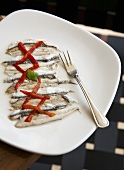 Anchovies with Roasted Red Peppers on a Plate