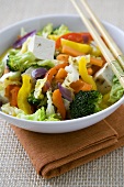 Tofu and Vegetable Stir Fry with Chopsticks