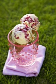 Two Raspberry Ripple Ice Cream Cones in a Pink Glass