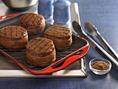 Bacon Wrapped Filet Mignons on Griddle