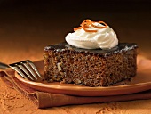 Piece of Prune Cake with Whipped Cream