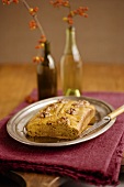 Pumpkin Bread with Walnuts and Maple Syrup; On Metal Dish