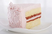 Slice of Yellow Cake with Strawberry Filling and Frosting