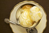 Bowl of Vanilla Ice Cream with Butterscotch Sauce; From Above
