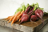 Radishes and Carrots on Cutting Board