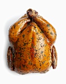 Whole Roast Chicken on White Background; From Above