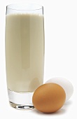 Protein Shake in Tall Glass; Fresh Eggs