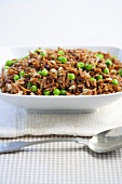 Toasted Orzo Pilaf with Peas in Serving Bowl