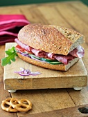 Cure Ham Sandwich on Whole Wheat Baguette; On Cutting Board