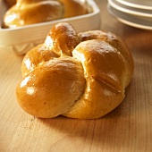 One Challah Roll on a Table